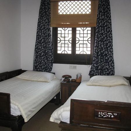 XI Di Travel Lodge Yi (Anhui) Phòng bức ảnh